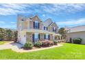 View of a lovely home with a well-kept lawn and a convenient attached two-car garage at 1618 Bay Meadows Nw Ave, Concord, NC 28027