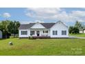 Charming single-story home with a welcoming front porch and well-manicured lawn at 170 Wagon Wheel Way # 4, Salisbury, NC 28147