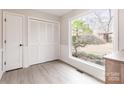 Bright room with a large window, featuring a serene view of the backyard at 1770 Windsor Dr, Lancaster, SC 29720
