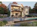 Stunning backyard with a modern pool, patio furniture, and a beautifully landscaped outdoor space at 2861 Sharon Rd # 1, Charlotte, NC 28211