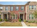Beautiful brick townhome with a manicured lawn and inviting entryway at 3436 Scottish Fern Ln # 172, Indian Land, SC 29707