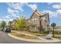 Street view of townhomes with landscaped lawns and sidewalks at 3436 Scottish Fern Ln # 172, Indian Land, SC 29707
