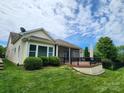 Beautiful backyard featuring a deck and a well-maintained lawn; perfect for outdoor enjoyment at 467 Granite Lake Ct, Denver, NC 28037
