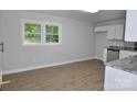Bright, open kitchen with a window featuring granite countertop at 1277 Eden Dr # 18, Chester, SC 29706