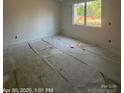 Bright bedroom offering a serene atmosphere and a picturesque view at 312 Wesley Heights Way # A, Charlotte, NC 28208