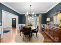 Elegant dining room featuring a stylish light fixture and sophisticated decor at 4622 Cotton Creek Dr, Charlotte, NC 28226