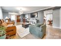 Open-concept living room featuring stylish furniture, hardwood floors, and modern decor at 622 University Dr, Rock Hill, SC 29730