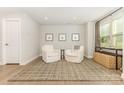 Cozy living room featuring neutral tones, stylish furniture, and ample natural light at 625 Uwharrie River Rd, Charlotte, NC 28211