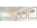Bright living area features Gathering photos, and lots of natural light at 1914 Loggerhead Dr, Lancaster, SC 29720