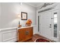 Entryway with hardwood floors, complemented by a decorative table and ornate wall decor at 2021 Pinyon Ln, Lancaster, SC 29720