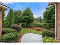 Lush backyard featuring a well-kept lawn and manicured landscaping at 310 Ridge Reserve Dr, Clover, SC 29710