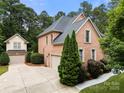 Beautiful brick home with a detached garage and long driveway at 310 Ridge Reserve Dr, Clover, SC 29710