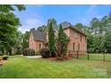 Beautiful brick home with a spacious yard and mature trees at 310 Ridge Reserve Dr, Clover, SC 29710