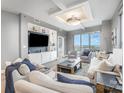 Bright living room featuring a large window and custom built-ins at 333 W Trade St # 1500, Charlotte, NC 28202