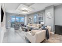 Comfortable living room with large windows showcasing skyline view at 333 W Trade St # 1500, Charlotte, NC 28202