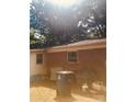 The backyard is a bit messy with a recycling bin and a few other items at 3715 Vanderburg Dr, Concord, NC 28025