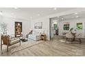 Open-concept living room flows into the dining area and kitchen at 1015 4Th St, Spencer, NC 28159