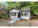 Charming home featuring white siding, black trim, and a welcoming front porch at 1155 Cedar Grove Ln, Rock Hill, SC 29732
