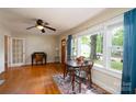 Welcoming living room with hardwood floors, natural light, and open layout, perfect for relaxing and entertaining guests at 118 Marshdale Sw Ave, Concord, NC 28025