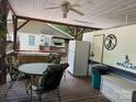 Cozy covered deck offers an inviting space for relaxation and entertainment at 146 Trivette Trl, Mount Gilead, NC 27306
