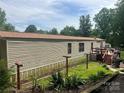Back exterior of this single Gathering home with backyard access and ample space at 2165 Peanuts Ln, Newton, NC 28658