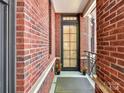 Charming front porch with brick accents and decorative details at 2810 Selwyn Ave # 104, Charlotte, NC 28209