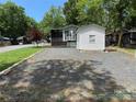 Attractive home with a well-kept lawn, storage shed, set in a friendly neighborhood at 102 Papoose Ct # D117, Mount Gilead, NC 27306