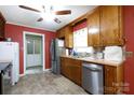 Bright kitchen featuring stainless steel appliances and warm wood cabinets at 1371 Hawks Nest Rd, York, SC 29745