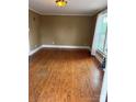 Spacious living room featuring hardwood floors and natural lighting at 1510 Stoker Ter, Albemarle, NC 28001