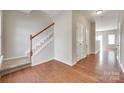 Inviting foyer with wood floors, staircase, and neutral paint palette at 2169 Shady Pond Dr, Clover, SC 29710