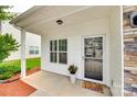 Close up of a cozy, inviting front porch with decorative accents at 2169 Shady Pond Dr, Clover, SC 29710