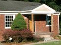 Close up of a well maintained brick home with manicured shrubbery at 2357 28Th Ne St, Hickory, NC 28601