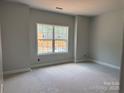 Bedroom with large window offering plenty of natural light at 2914 Waterford Ln # 33A, Albemarle, NC 28001