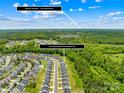 Aerial view of a residential neighborhood with easy access to uptown Charlotte at 3110 Streamside Dr, Davidson, NC 28036