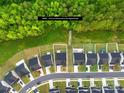 Aerial view of homes backing up to green space, highlighting the property's location at 3110 Streamside Dr, Davidson, NC 28036