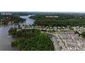 Stunning aerial view of home at 137 Flora Vista with lake access and lush green surroundings at 137 Flora Vista Dr, Mooresville, NC 28117
