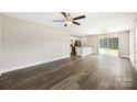 Bright living space with hardwood floors, flowing seamlessly into a kitchen and dining area at 209 S Gregory St # 3, Lancaster, SC 29720