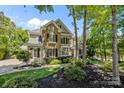 Charming home with stone and siding, complemented by a well-maintained front yard at 238 Horton Grove Rd, Fort Mill, SC 29715