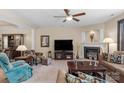 Spacious living room featuring comfortable seating, a fireplace, and stylish decor at 6104 Follow The Trl, Indian Trail, NC 28079