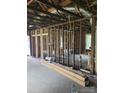 Interior view of a house being renovated, with exposed framing, new building materials, and open spaces at 720 Mutual Rd, Gastonia, NC 28052
