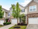 Attractive exterior showcasing a one-car garage, tidy landscaping, and classic architectural details at 7325 Overmountain Dr, Rock Hill, SC 29732