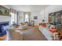 Bright living room with stylish decor, hardwood floors, and ample seating, creating a cozy and elegant atmosphere at 1567 Jennings Rd, Statesville, NC 28625