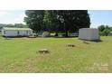 Large backyard with lots of potential for outdoor activities at 338 Hickory Grove Rd, Harmony, NC 28634