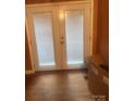 Entryway with light-filled glass doors leading to a bright outdoor space at 1313 Lower Dallas Hwy Hwy, Dallas, NC 28034