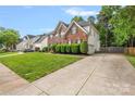 Well-maintained home with a long driveway, lush lawn and landscaping in a desirable neighborhood at 139 Forest Walk Way, Mooresville, NC 28115