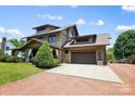 Charming two-story home with a large driveway and attached two-car garage at 14701 Cabarrus Rd, Mint Hill, NC 28227