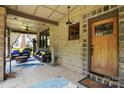 Inviting covered front porch with comfortable seating and stylish decor at 14701 Cabarrus Rd, Mint Hill, NC 28227