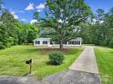 Beautiful home on a large lot with a long driveway, providing ample space and privacy at 263 Fairway Cir, Rock Hill, SC 29730