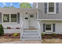 Welcoming front entrance features a classic white door with sidelights and a well-maintained brick facade at 1814 Brookdale Ave, Charlotte, NC 28210