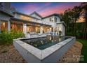 A modern pool and patio area offer a relaxing outdoor space at 188 Blarney Rd, Mooresville, NC 28117